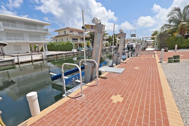 dock area featuring a water view