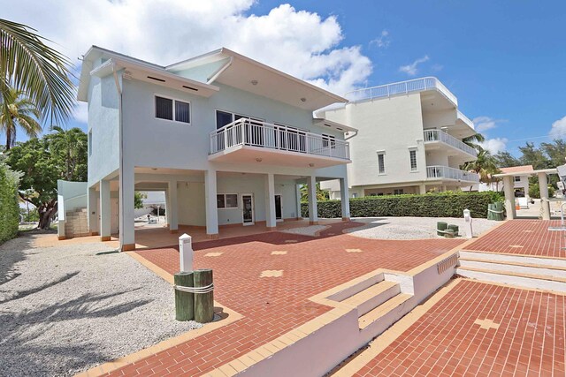 back of house featuring a patio area