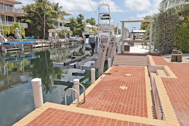 view of dock with a water view