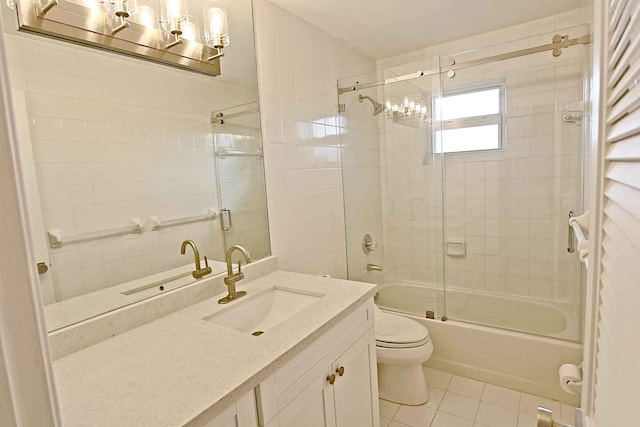 full bathroom featuring enclosed tub / shower combo, tile patterned floors, toilet, and vanity