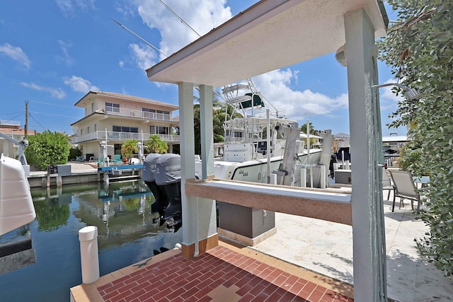 dock area featuring a water view