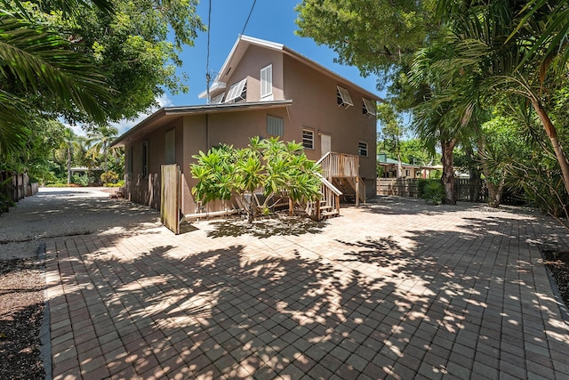 view of home's exterior featuring a patio