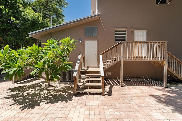 doorway to property featuring a patio area