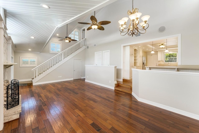 unfurnished living room featuring sink, dark hardwood / wood-style floors, and high vaulted ceiling