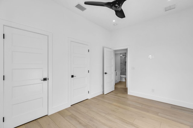 unfurnished bedroom with light wood-style floors, recessed lighting, visible vents, and baseboards