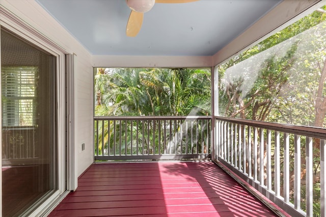 wooden terrace featuring ceiling fan