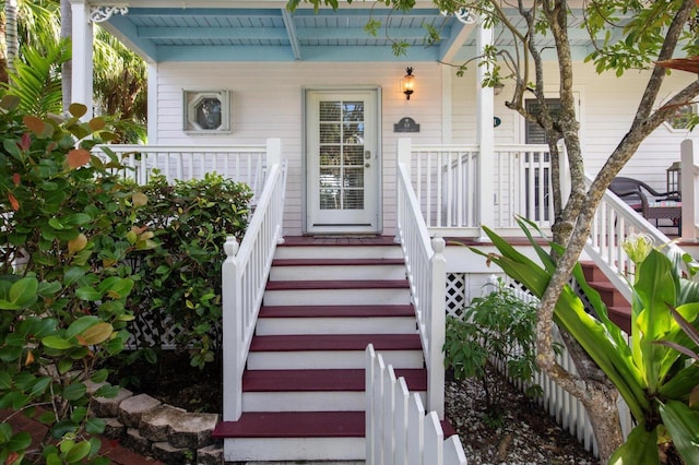 entrance to property with covered porch