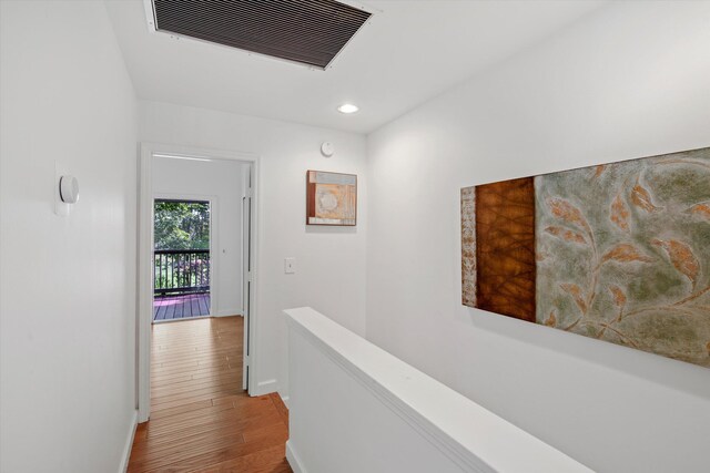 hall featuring wood-type flooring