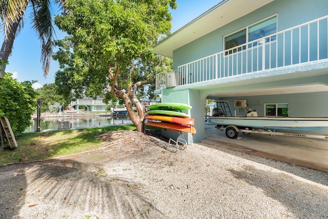 exterior space with a water view