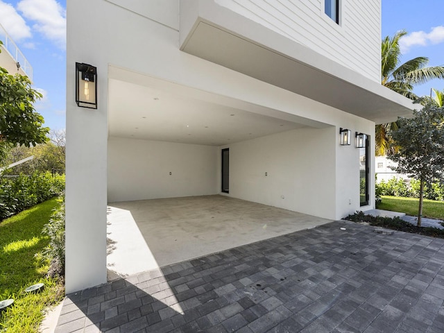 view of patio with decorative driveway