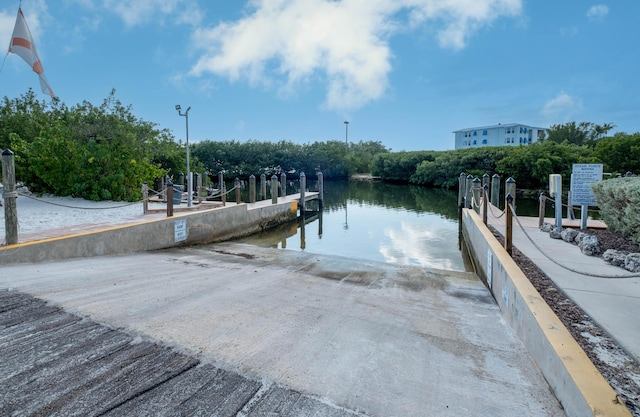 dock area featuring a water view