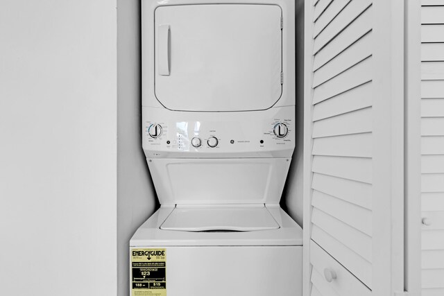 laundry room featuring stacked washer / dryer