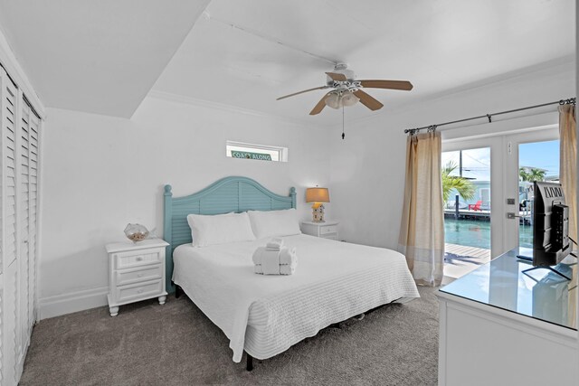 carpeted bedroom featuring multiple windows, ornamental molding, access to outside, and ceiling fan