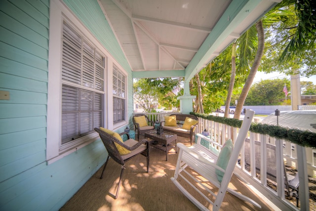 view of patio / terrace with a porch and an outdoor living space