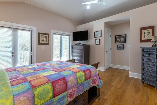 810 Terry Ln, Key West, FL 33040 - bedroom featuring access to outside, vaulted ceiling, light wood-style floors, and ceiling fan