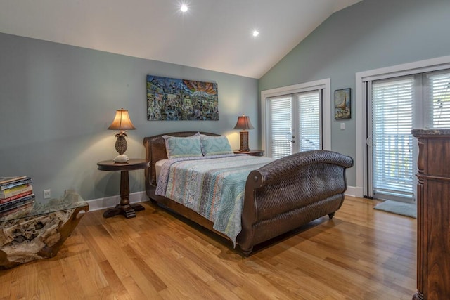 810 Terry Ln, Key West, FL 33040 - bedroom featuring access to outside, light wood-style flooring, multiple windows, high vaulted ceiling, and recessed lighting