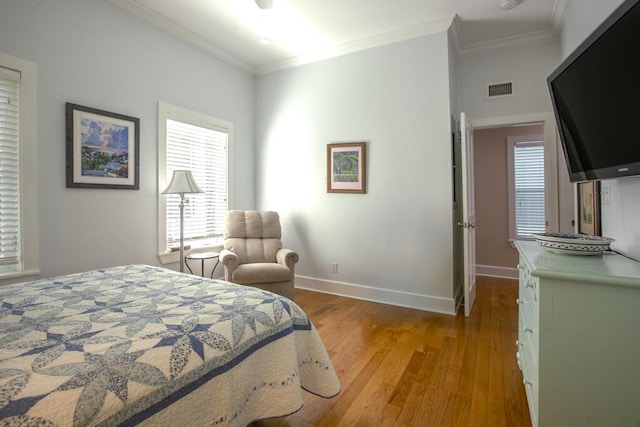 810 Terry Ln, Key West, FL 33040 - bedroom featuring light wood-style floors and ornamental molding