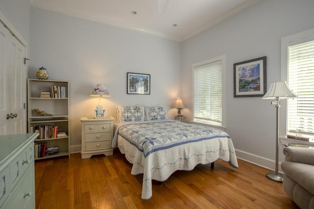 810 Terry Ln, Key West, FL 33040 - bedroom featuring wood finished floors and ornamental molding