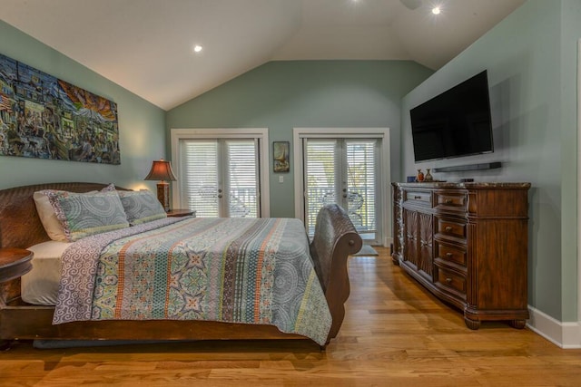 810 Terry Ln, Key West, FL 33040 - bedroom with access to outside, light wood finished floors, vaulted ceiling, and recessed lighting