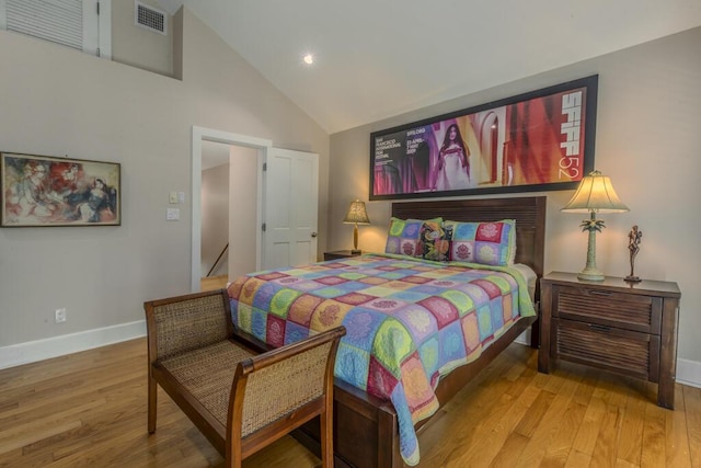 810 Terry Ln, Key West, FL 33040 - bedroom with wood finished floors, high vaulted ceiling, and recessed lighting