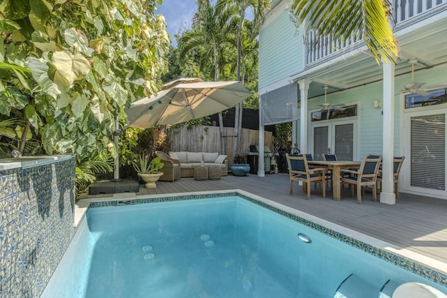 810 Terry Ln, Key West, FL 33040 - view of pool featuring a deck, ceiling fan, outdoor dining space, an outdoor living space, and grilling area