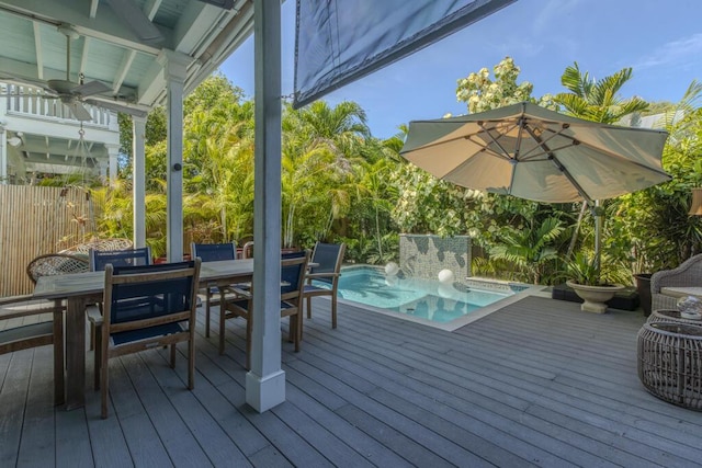 810 Terry Ln, Key West, FL 33040 - wooden deck featuring outdoor dining area and ceiling fan