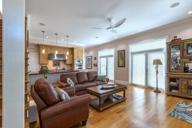 810 Terry Ln, Key West, FL 33040 - living room with ceiling fan, light wood-style flooring, crown molding, and recessed lighting