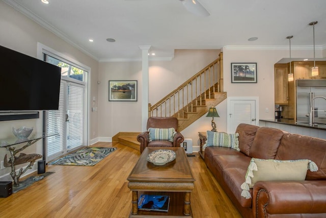 810 Terry Ln, Key West, FL 33040 - living room featuring light wood finished floors, stairs, ornamental molding, and recessed lighting