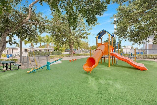 view of playground featuring a yard