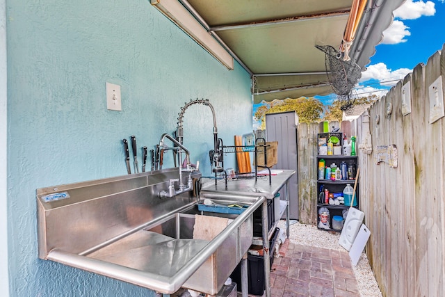 view of patio featuring sink