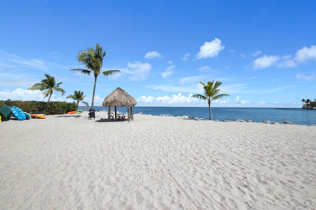 view of water feature with a gazebo and a beach view