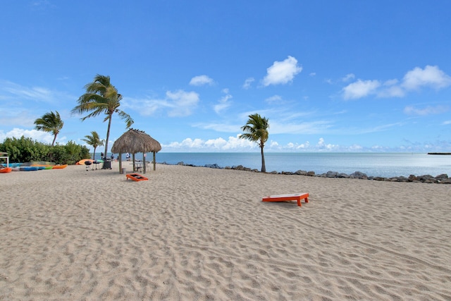 view of water feature with a gazebo and a view of the beach