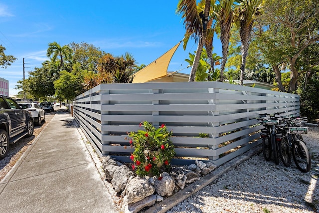 view of side of property with fence