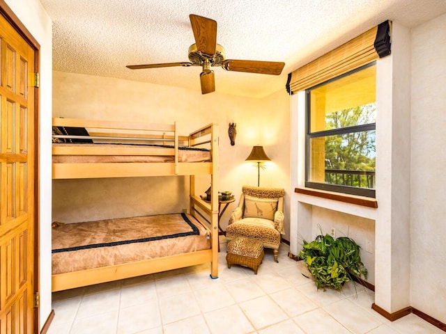 101 E Ocean Dr Unit C304, Key Colony, FL 33051 - bedroom with ceiling fan and a textured ceiling