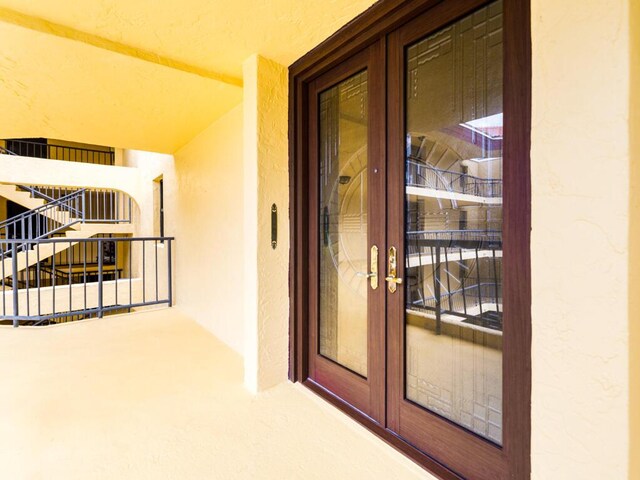 101 E Ocean Dr Unit C304, Key Colony, FL 33051 - property entrance with french doors