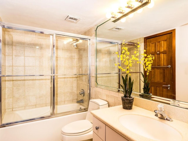 101 E Ocean Dr Unit C304, Key Colony, FL 33051 - full bathroom featuring vanity, combined bath / shower with glass door, and toilet