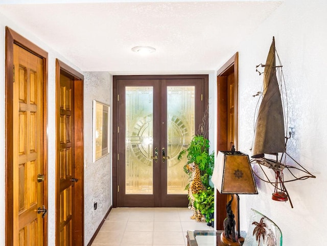 101 E Ocean Dr Unit C304, Key Colony, FL 33051 - doorway featuring light tile patterned floors and french doors