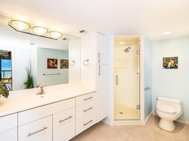 101 E Ocean Dr Unit C304, Key Colony, FL 33051 - bathroom with vanity, tile patterned floors, toilet, and walk in shower