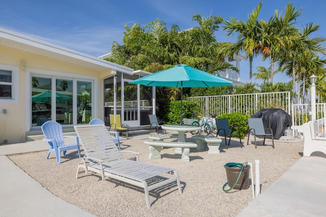 view of patio with a grill