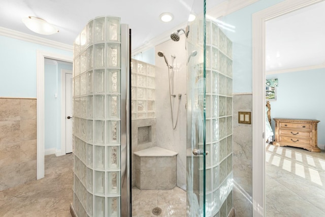 bathroom featuring walk in shower, ornamental molding, and tile walls