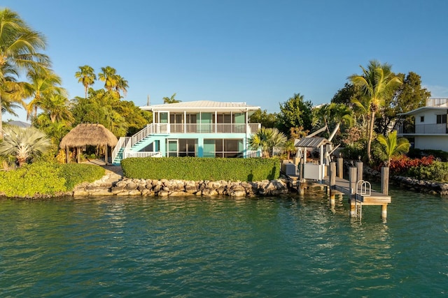 exterior space with a gazebo and a water view