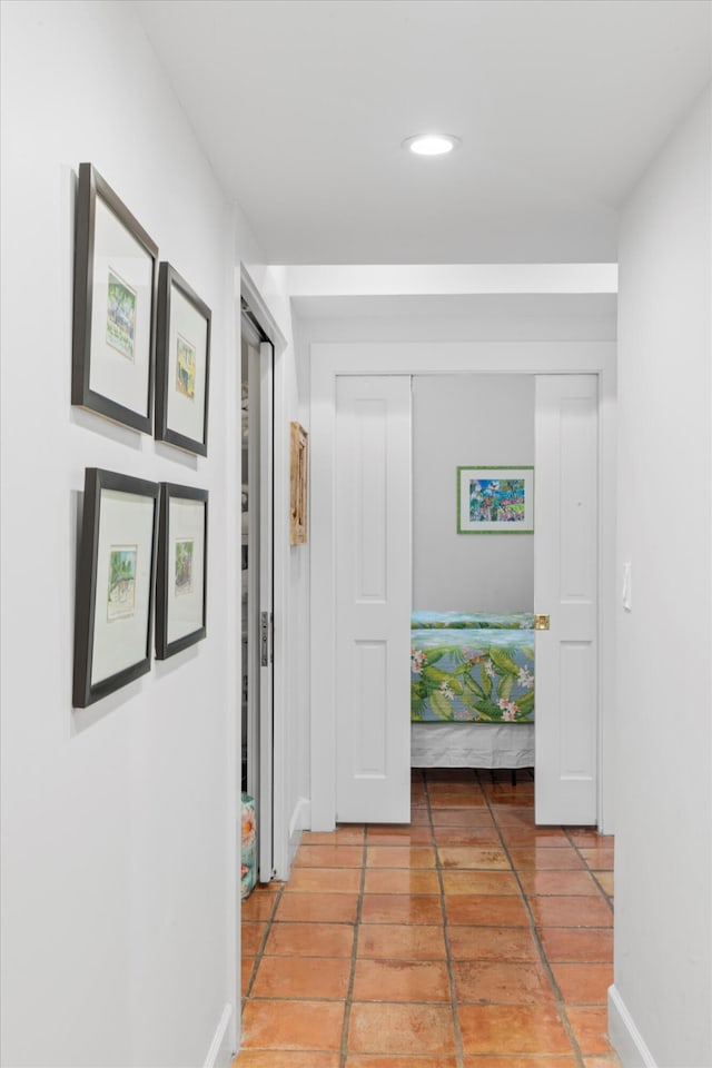 corridor featuring tile patterned floors