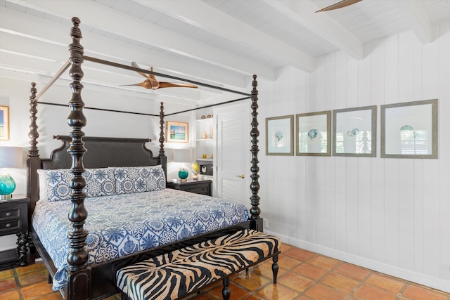 bedroom with beam ceiling