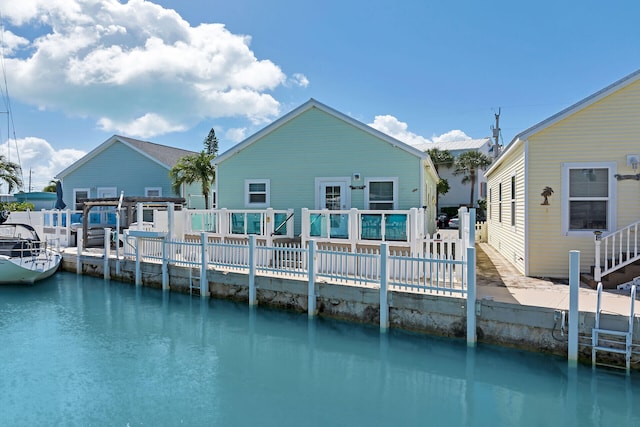 rear view of house with a water view