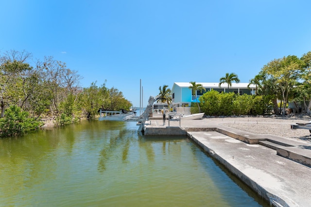 3742 Seagrape St, Big Pine, FL 33043 - dock featuring a water view and boat lift
