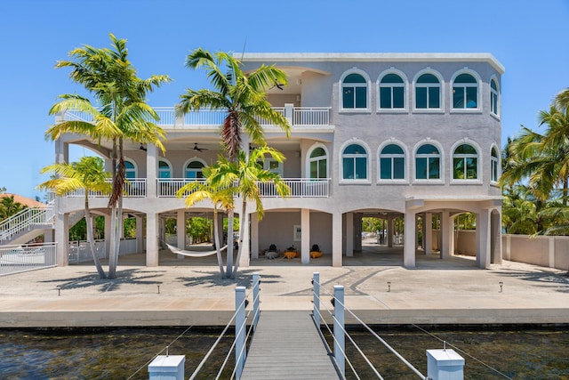 3742 Seagrape St, Big Pine, FL 33043 - rear view of property featuring a balcony, a carport, stairway, a patio, and ceiling fan