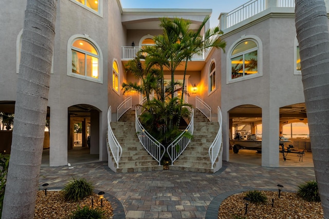 3742 Seagrape St, Big Pine, FL 33043 - view of exterior entry featuring stucco siding and a balcony