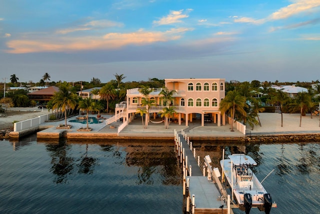 3742 Seagrape St, Big Pine, FL 33043 - dock featuring boat lift and a water view