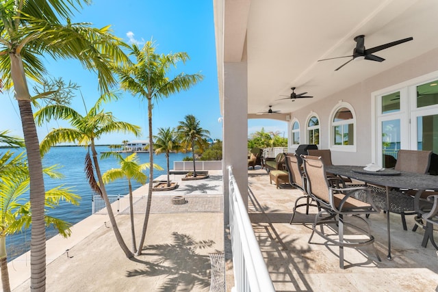3742 Seagrape St, Big Pine, FL 33043 - view of patio / terrace featuring a water view, ceiling fan, and outdoor dining area