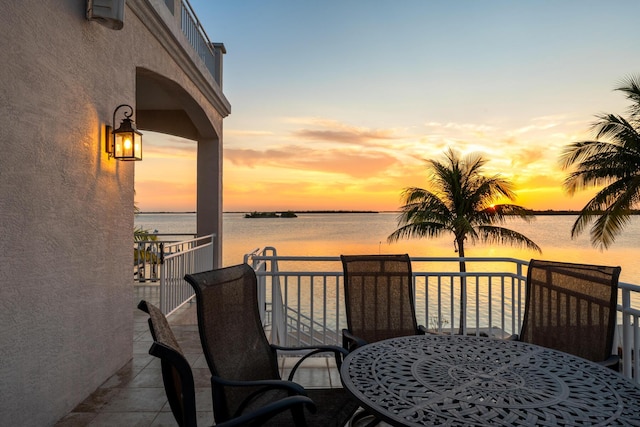 3742 Seagrape St, Big Pine, FL 33043 - balcony at dusk with a water view and outdoor dining area